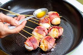 Scallops are one of the simplest things to grill and so delicious when done right. Bacon Wrapped Scallops With Lime Maple Glaze