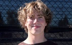 PREP TENNIS: East edges South in duals