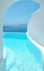 This Santorini Hotel Has Rooms With Secret Tunnels Leading To Hidden Infinity Pools And The Views Are Santorini Hotels Dana Villas Beautiful Places To Travel