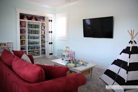 Here's 7 brilliant ways to hide kids' toys in the living room. Organized Playroom The Sunny Side Up Blog