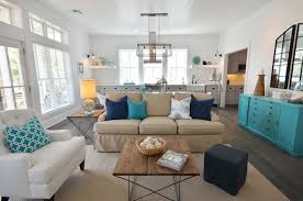 Open Plan Beach House Living Room And Kitchen With Glossy White Beadboard Ceilings Over White Shiplap C Beach Living Room Home Living Room Cottage Living Rooms