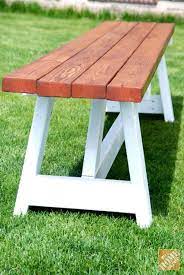 This idea transforms simple outdoor wooden bench plans into a designer seating area. Diy Project Farmhouse Bench The Home Depot Farmhouse Bench Diy Farmhouse Diy Projects Diy Bench Outdoor