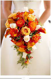 Fresh in the autumn months, grevillea offers layers of green tone. Fall Orange Teardrop Bridal Bouquet Red Bouquet Wedding Orange Wedding Flowers Fall Wedding Bouquets