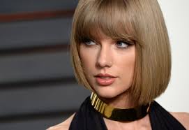 Taylor Swift falls off a treadmill for an Apple Music video.