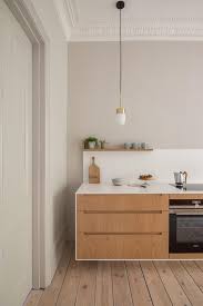 a cooktop and wall oven in the kitchen