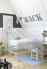 13 Ideas For Decorating With A Sloped Ceiling Mabey She Made It Sloped Ceiling Bedroom Bedroom Design Baby Decor