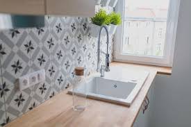 Of course, at its core, a backsplash is meant to be functional—a protective backboard to catch spills and prevent stains behind your stove or sink. Adhesive Tile Mat Backsplash Pros And Cons