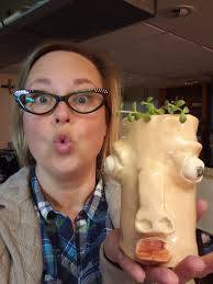 Found this amazing sculpture in Overland Park, KS. Someone named Emily made  it..... and I am VERY happy she did! Added some dirt and a plant and it's  waiting for my husband