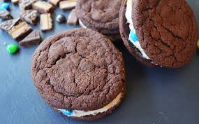 Oreo Stuffed Candy Monster Cookies Homemade Oreo Cookies With A Candy Bar Cream Cheese Filling A S Chocolate Nutella Nutella Sandwich Chewy Chocolate Cookies