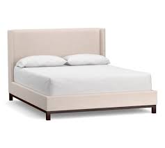 In need of assistance or have a. Jake Upholstered Platform Bed With Wood Legs Pottery Barn