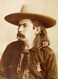 Oklahoma Bill' Wild West Performer & Cornetist 1890 S- Wearing A Great  Western Cowboy Hat, Has A Great Western Look, Also Wearing A Gar Badge.  Poster Print by J.D. Maxwell