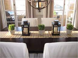 Curved flower glass centerpiece on a cherrywood dining table. 41 Stunning Kitchen Table Centerpiece Ideas 31 Everyday Table Centerpieces Google Dining Room Table Decor Modern Kitchen Tables Dining Room Table Centerpieces