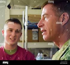 U.S. Army Sgt. Major Marcus Carter, assigned to U.S. Army Central (ARCENT),  right, and Capt. Mohamed Alsebaiei, a Royal Bahraini Air Force officer,  left, collaborate