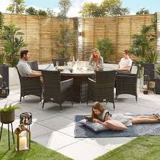 Besides those outdoor dining or bistro sets, a swing will surely enhance the fun of every outdoor living space. Amelia 8 Seat Round Dining Set With Fire Pit Brown