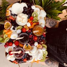 Lots of fruit, coconut, chocolate and fresh mint! Introducing The Pavlova Grazing Platter Successor To The Cheeseboard