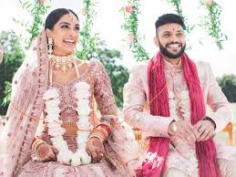 Check spelling or type a new query. A Bride And Groom Wore Matching Pink Outfits To Their Wedding