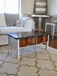 A coffee table with a lower shelf works great in these spaces because you can place books and trays underneath, leaving plenty of room on top. Old Dresser Turns Coffee Table Lake Girl Paints Furniture Furniture Inspiration Furniture Decor