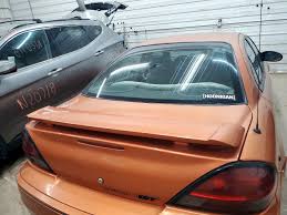 Image result for Sunburst Orange 2004 Pontiac