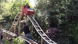 All kinds of backyard roller coaster rides you can buy. Dad Built A Diy Roller Coaster In His Backyard Diy Backyard Backyard Cool Diy Projects