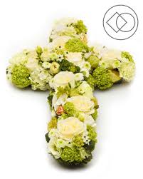 Those who attend a funeral service often bring mourning bouquets or sympathy arrangements as a display. Cross Shaped Funeral Arrangement Sympathy Funeral Interflora Eesti Flower Delivery