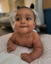 7 months Our sweet Eli guy brings sooo much joy to our fam! He is *almost*  always smiling and giggling! He adores his sister and lights up whenever  she's around. I love