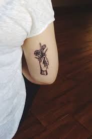 Traditional Hand Holding Flowers Tattoo Tattoo Designs Ideas Tattoo artist realistic, portrait black and grey all day working @ lifestyle garage / albstadt see more of flow draw tattoo on facebook. traditional hand holding flowers tattoo
