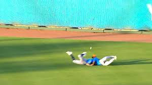 Lasko and Taylor collide in center field