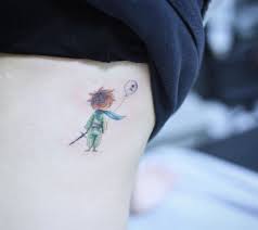 This simple design is perfect for the first this tattoo depicts a beautiful rose flower with that is green and blue with three butterflies hovering. 45 Get Inspired With These Charming Little Prince Tattoos Design