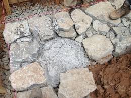 When starting a new layer, each rock should overlap do not build the stem wall higher than 8 feet (2.4 m). Building A Stone Foundation This Cob House