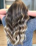 4 Ways to Make Beach Waves in Your Hair With a Flat Iron ...