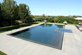 Nice And Tidy Dark Coping Lighter Surrounds Swimming Pools Backyard Backyard Pool Pool Designs