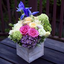 Multicolor Flower Arrangement In A Wooden Container Flower Arrangements Floral Arrangements Fresh Flowers Arrangements