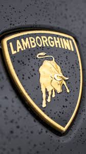 Black And Gold Car Wallpaper Tap And Get The Free App Men S World Lamborghini Logo Black Stylish Gold Shield Car For Guys Hd Iphone 6 Plus Lamborghini Logo Lamborghini Lamborghini Cars