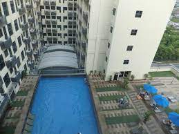 Guests can exercise at the gym, relax with a massage at the spa, or simply lounge in the sauna room. Scenic View Of The Swimming Pool And Town Area Picture Of Ming Garden Hotel Residences Kota Kinabalu Tripadvisor