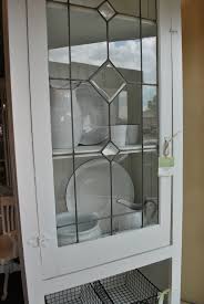 White Shaker Cabinets With Beveled Glass Google Search Leaded Glass Cabinets Glass Kitchen Cabinet Doors Glass Kitchen Cabinets