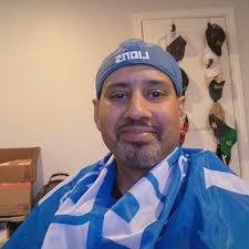 Gov. Whitmer celebrates 'Faturday' with official proclamation honoring Andy  Isaac