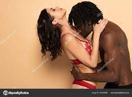 Handsome African American Man Hugging Kissing Breast Sexy Woman Beige Stock  Photo by ©IgorVetushko 372539460