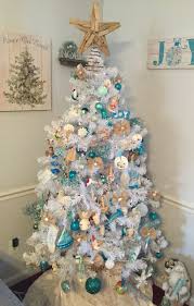 I always decorate my staircase with a garland, but i have the hardest time finding a beachy garland! O Christmas Tree O Christmas Tree Annual Coastal Christmas Tree Contest Caron S Beach House