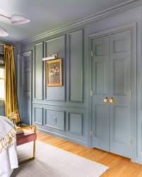 Crown moulding in the living and dinning room and the dinning room has a dedicated plate rail. This Paint Trick Will Make Your Room Look Bigger Than It Actually Is