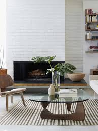 Influenced by his mentor, romanian sculptor constantin brancusi, and by the abstract forms of jean arp and japanese zen gardens, noguchi gained acclaim in 1946 when his biomorphic interlocking stone sculptures were included in 14 americans at the museum of modern art. Noguchi Coffee Table Walnut