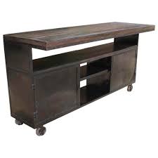 Beautiful overhead lamps add industrial character to this interior, in made in white colors, the kitchen island with stainless steel elements is a functional, very stylish part of the kitchen. Kitchen Island Industrial Rolling Large Sideboard Buffet Cabinet