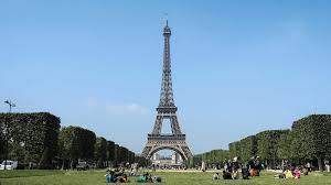8 Free Zoom Backgrounds For The Travel Lover Saba Bok Eiffel Tower On A Sunny Day Travel Lover Portland Travel Guide Portland Travel