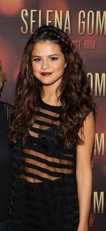 And it's that updo we're here to discuss. Selena Gomez Big Boho Wavy Hair With Braid My Fav Selena Gomez Hair Selena Gomez Style Selena Gomez