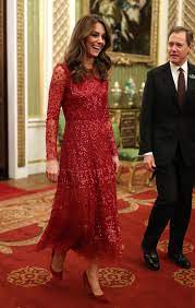 She visited the wardrobe, hair and makeup departments before meeting the actors and watching some of the filming. Kate Middleton Dazzles In A Beaded Red Dress For A Reception At Buckingham Palace Glamour