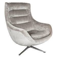 Picture a dark, mid century leather lounge chair in the corner of your living room, or a soft cream lounge chair in your baby's nursery. Mid Century Modernist Curved High Back Swivel Chair In Platinum Velvet Swivel Chair Chair Swivel Lounge Chair