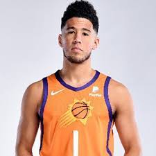 Devin booker is a professional american basketball player who plays for the 'national basketball association' (nba) team 'phoenix suns.' he was born to famous basketball player melvin booker. Devin Booker