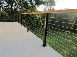 Duralife is offering four dynamic railing systems. Black Aluminum Posts Wood Top Rail Cable Infill In Malvern Pa Transitional Deck Philadelphia By Cable Railing Direct Houzz