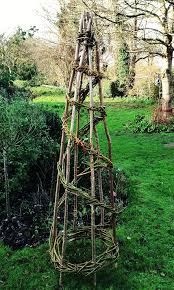 These garden obelisks stand is to provide the perfect structure to support vines and flowering plants. Garden Obelisk Hazel And Willow Mark And Rebecca Ford Flickr