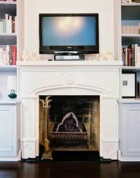 Well constructed over all, with an easy to use electric fireplace, these beautiful additions will give your home a sense of elegance. Bookshelves On Both Sides Of A Fireplace Photos Design Ideas Remodel And Decor Lonny