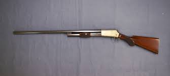 Prototype 1893 Shotgun. This gun has all the hallmarks of a John Browning prototype and shows a distinct similarity to Winchester's Model 1893. A couple of changes, most notably a smaller forend